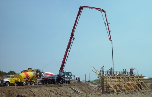 Pumping Concrete into wall forms of new Heritage Center.