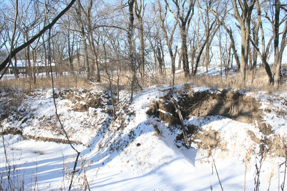 The erosion caused along Cub Creek by the parking lot drain.