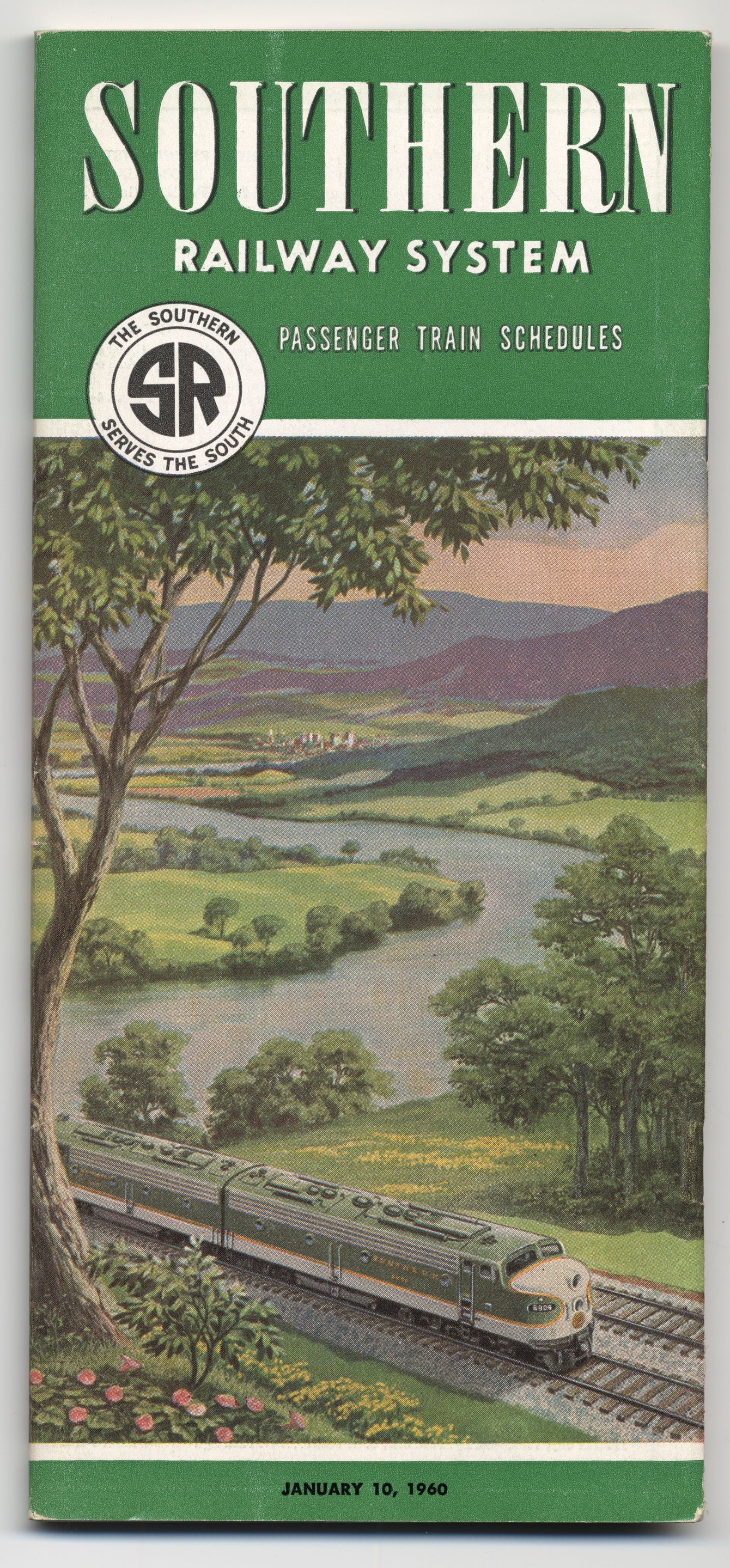 A timetable booklet with an illustration of a train with a landscape scene on the front. The booklet has 33 pages.