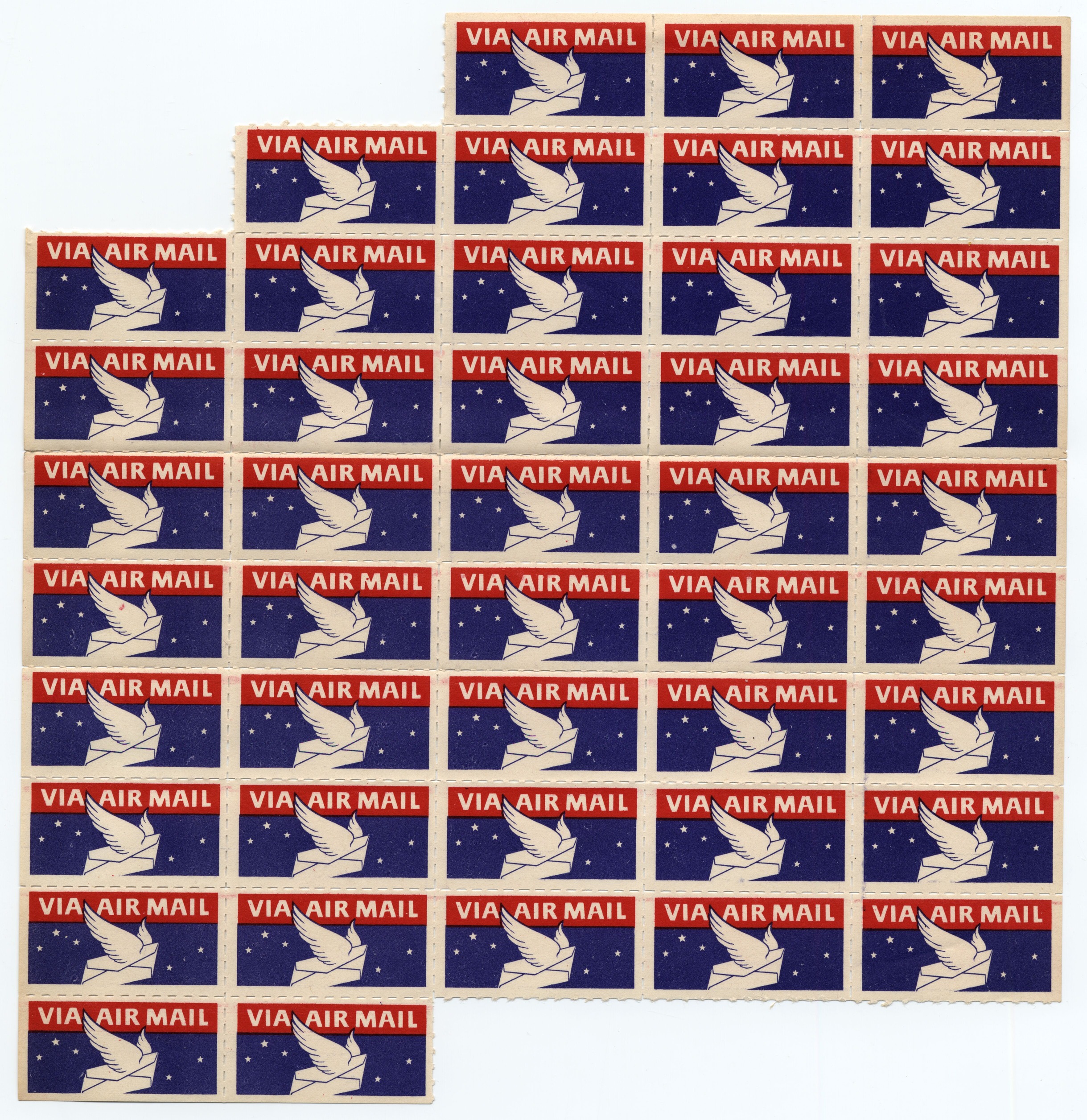 A sheet of labels. The labels are red, white, and blue with an envelope with wings.