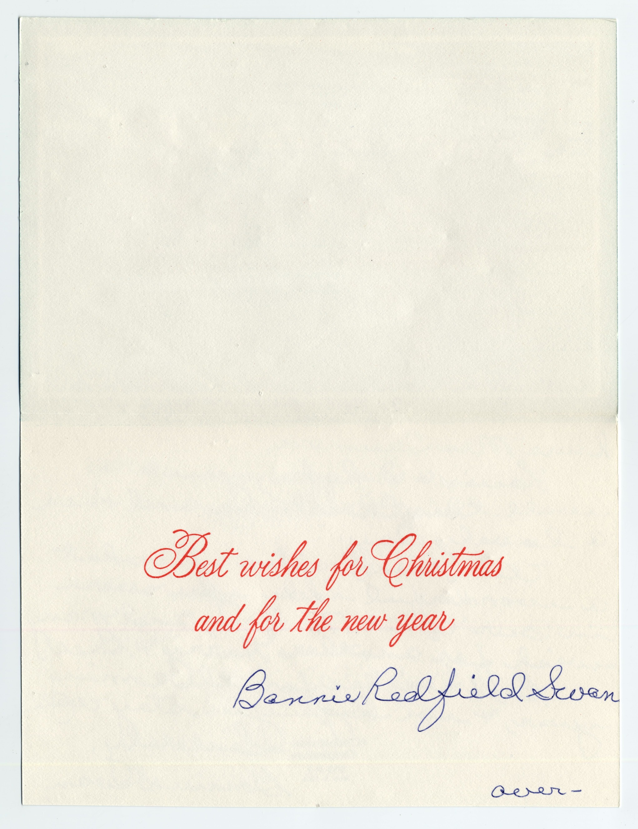 A card with an illustration of a town in winter on the front.