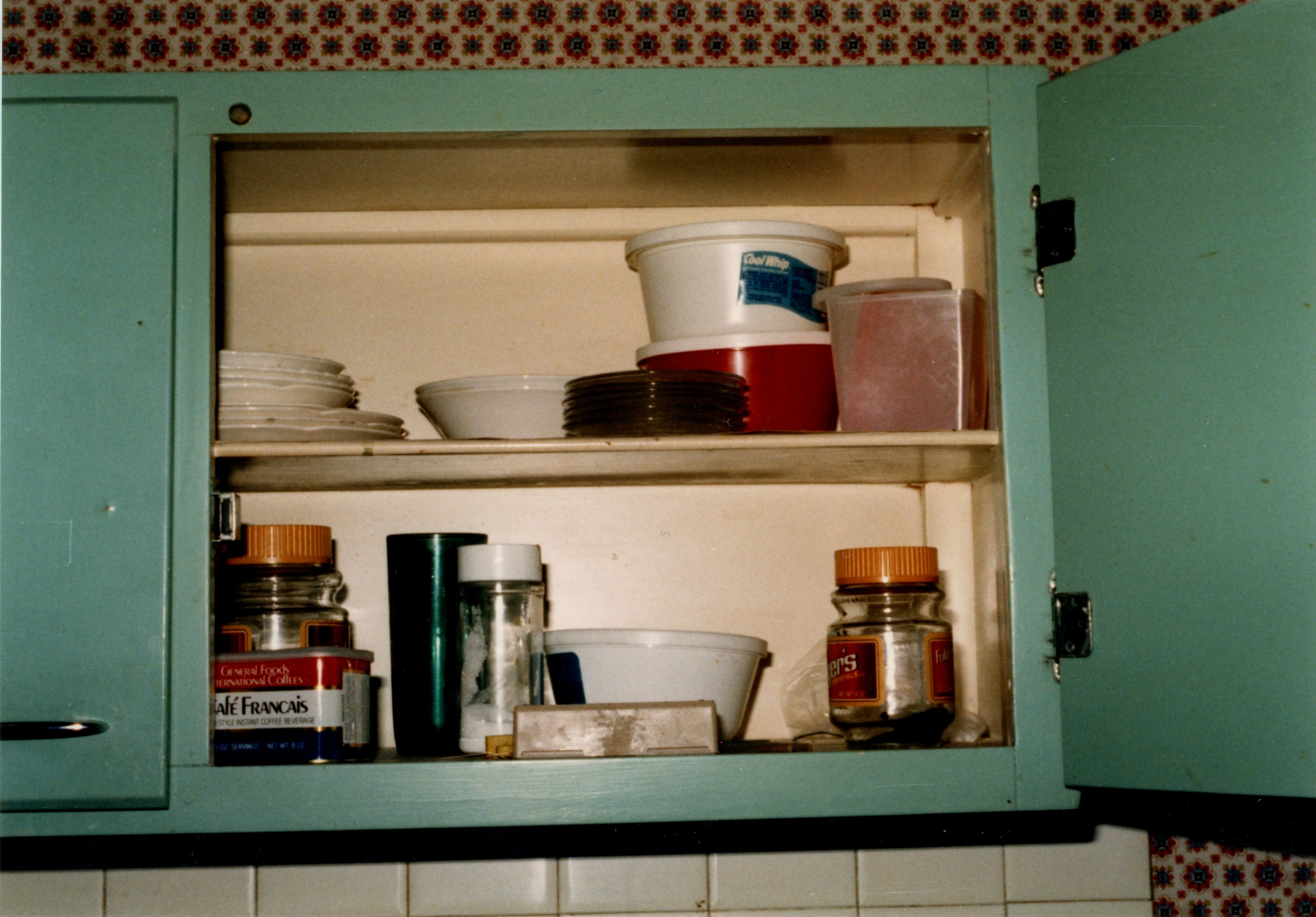 Kitchen cabinet above sink (east)