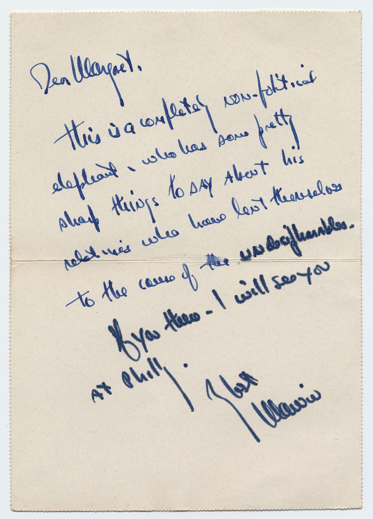 A postcard with an illustration of three women and an elephant on a beach on the obverse. The postcard folds open and inside is a note written in blue ink.