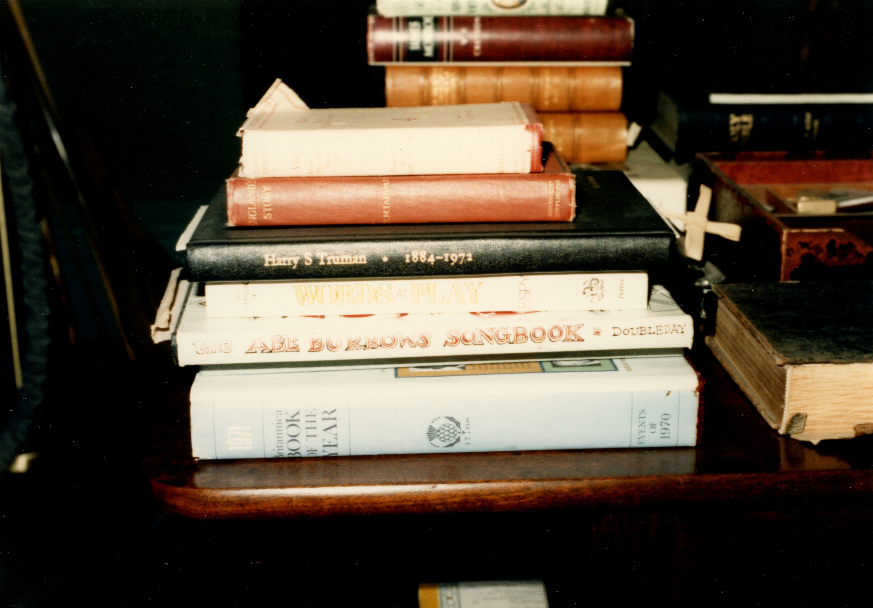 Books on south east corner of card table in study