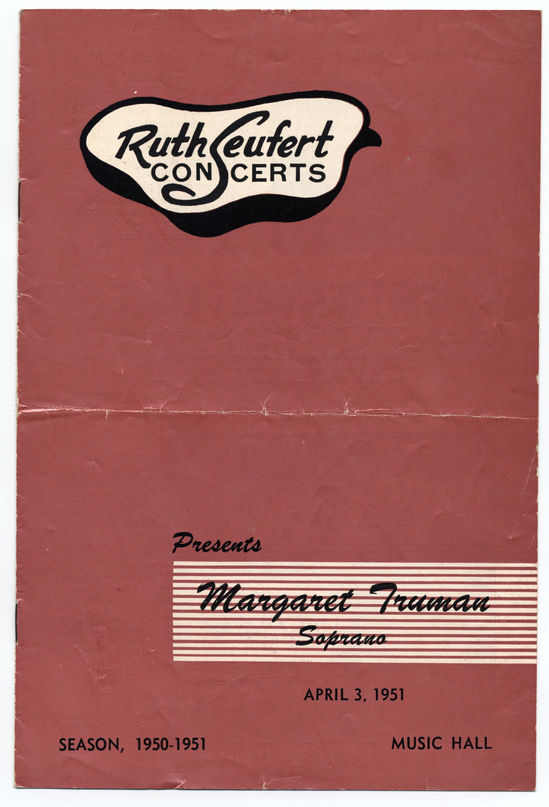 A program with a pink cover and 8 pages.