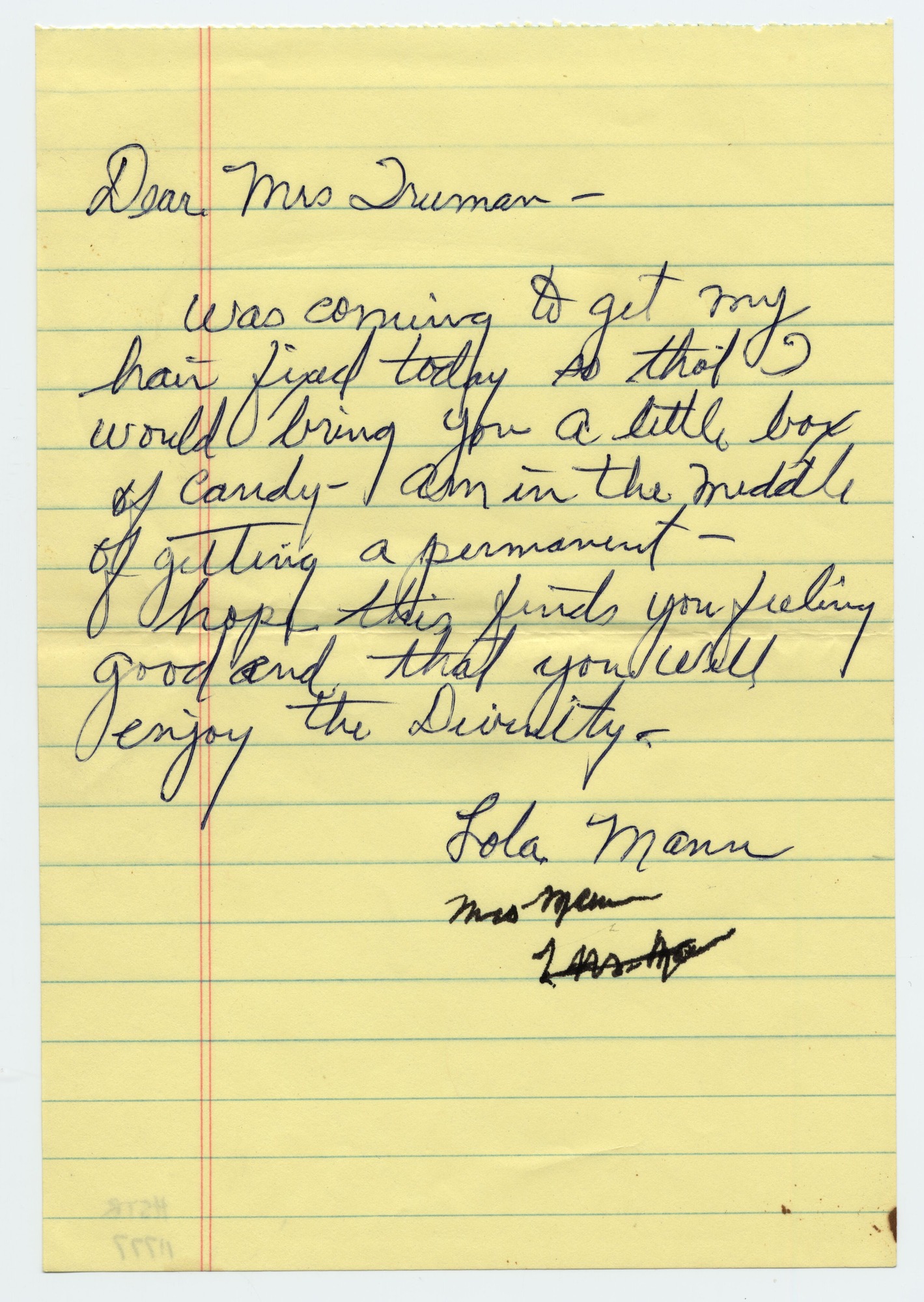 A letter written on yellow, lined paper.