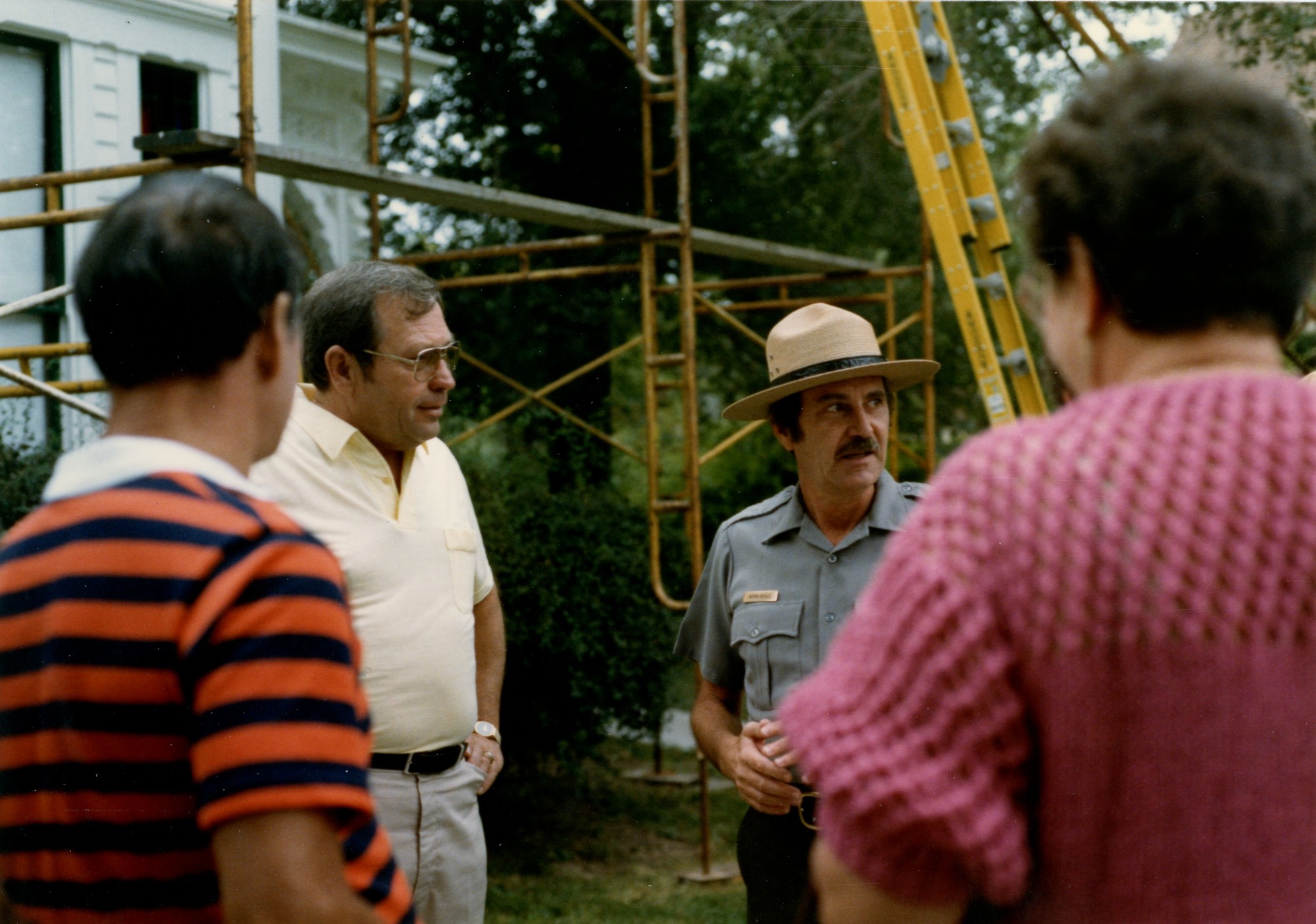 Norm Reigle and 100,000 visitor Harlan Froemming