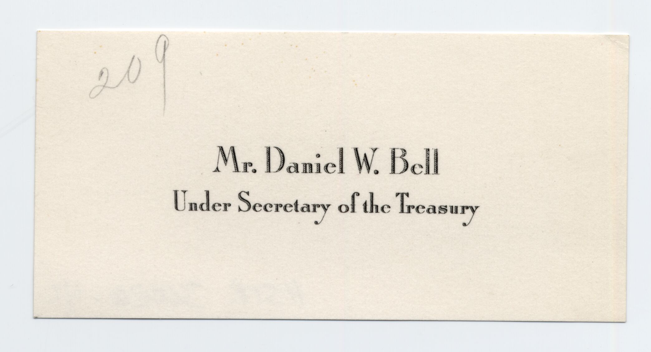 A small calling card with the visitor's name printed in the center.