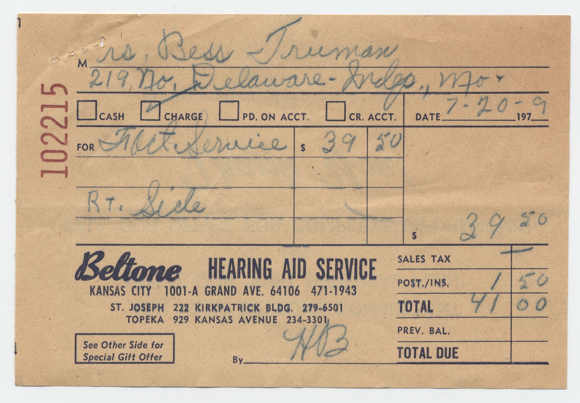 A receipt form filled out with blue ink.