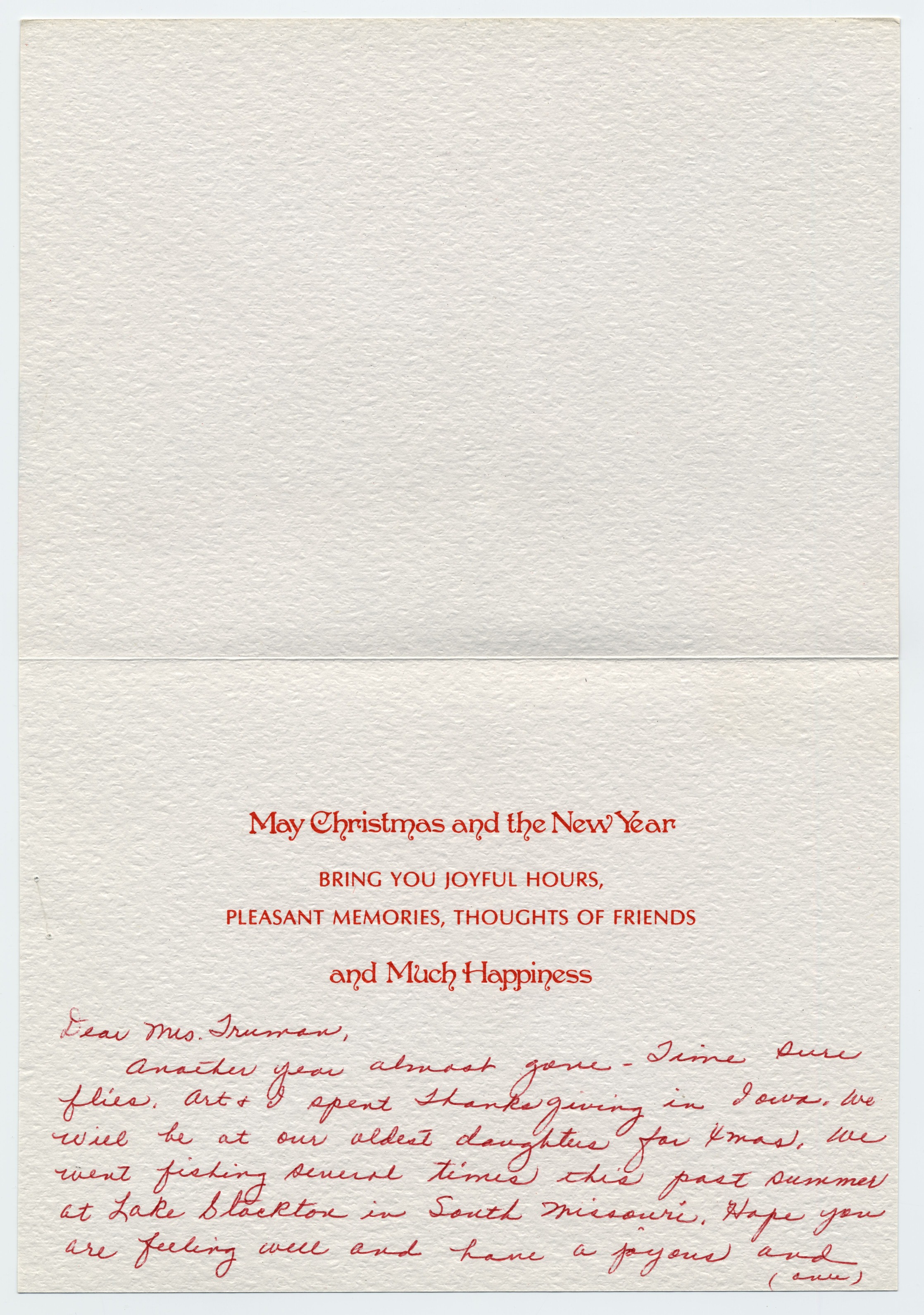 A card with an illustration of Mary, Joseph, and Jesus with a landscape in the background.