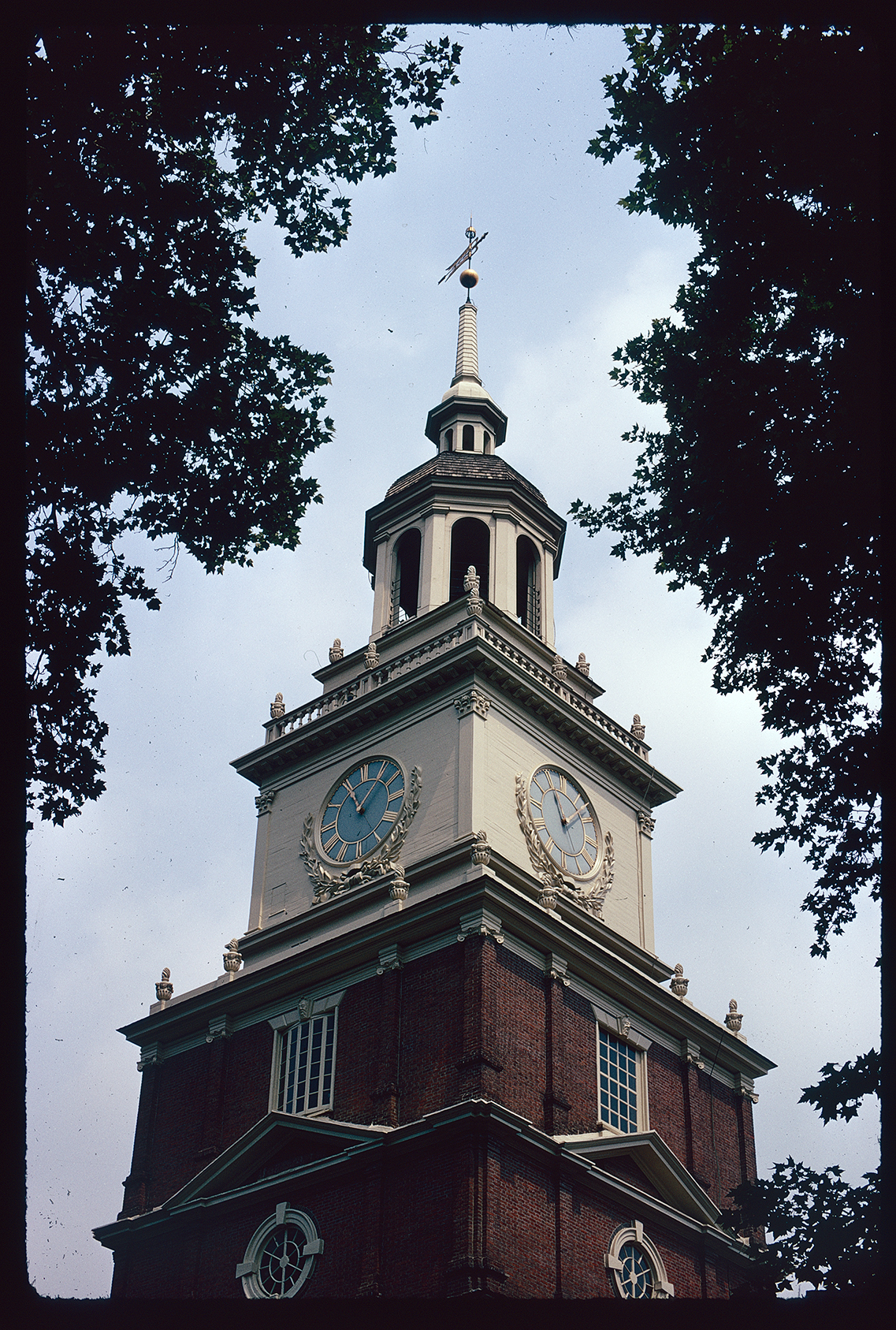 Independence Hall. Exterior. Looking up at Independence Hall Tower. Tower clock, nearly 11:05 AM.