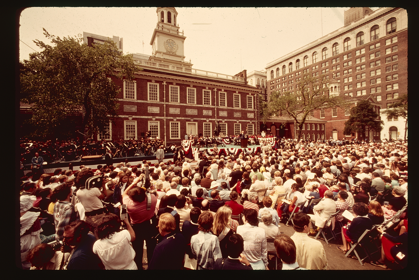 Independence Hall. President Gerald Ford's visit during the Bicentennial. Looking north across Chestnut Street. Tower clock, 11:20 AM.