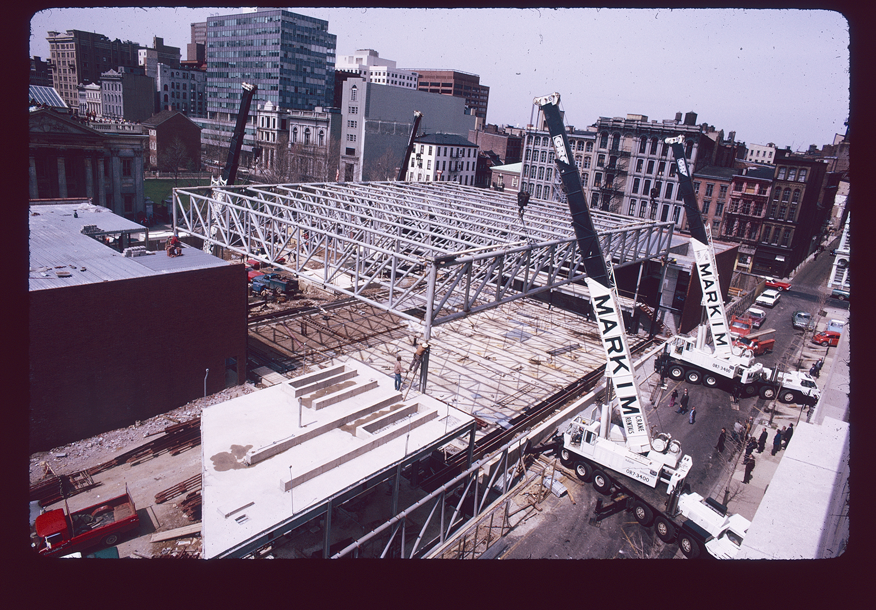 (Old) Visitor Center (101 South 3rd Street). Low aerial view. Construction. Looking northwest from over Bank Street, towards corner of 3rd & Chestnut St.