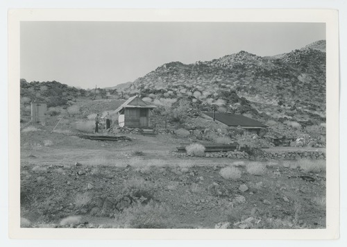 Black and white image of Briest's Mining Camp at foot of Eagle Mts.