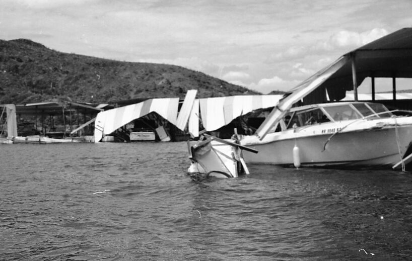 Damaged boat and docks at Callville Bay Marina