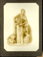 Curly with Wrapped Braids, Necklaces and Rings; Full View,