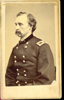 Brigadier General George Armstrong Custer Wearing Military Uniform with Shoulder Insignia Visible, Seated in Long Bust View Facing Left