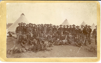 Group of Soldiers in Front of Four Conicle Tents