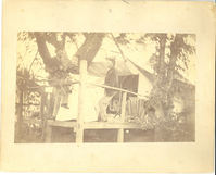 George Armstrong Custer, Elizabeth Bacon Custer, and Thomas Ward Custer Standing on a Porch Built in Front of a Tent