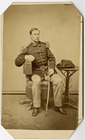 Captain George Yates Seated in a Fringe Chair with Cavlary Sword