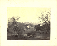 Camp Site of Custer's Troops in Texas with Buildings and a Fence