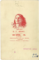 Bull Head in Full Regalia and Holding a Pipe