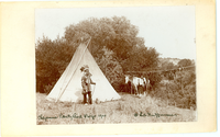 Cheyenne Chief Plenty Bird and His Wife in Front of a Tipi with Jerked Meat