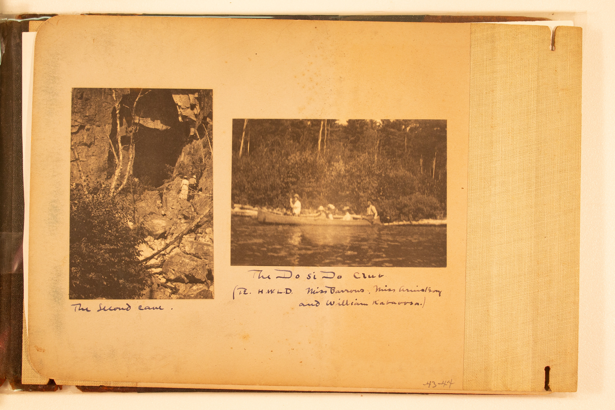 View of a landscape and a view of people in a canoe.