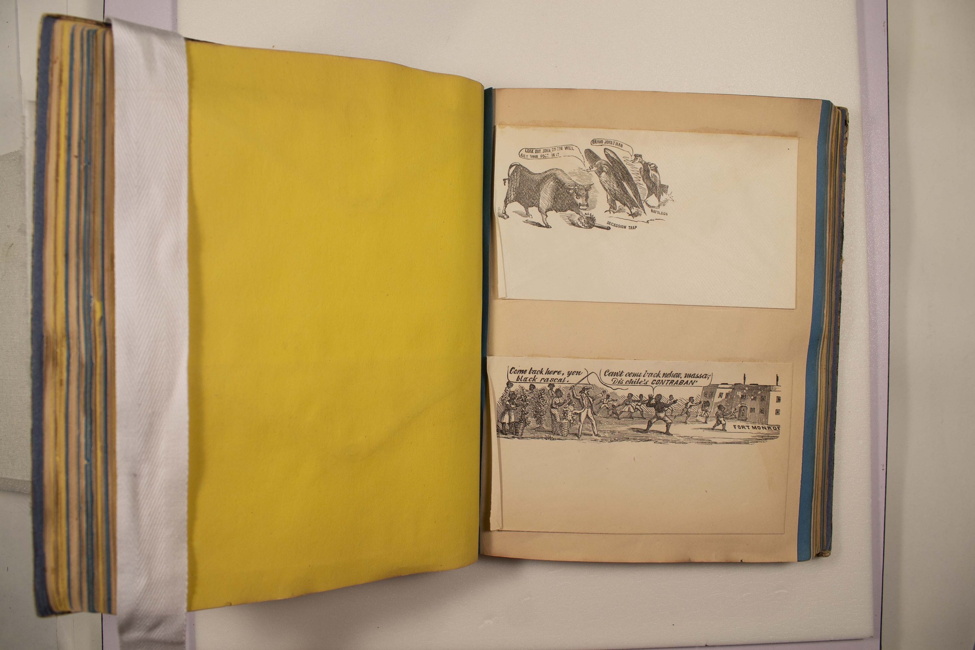 Back of two envelopes which have been glued to page.