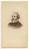 Graying Henry Wadsworth Longfellow with beard. Head and shoulders visible against blank background. Longfellow wears a dark-colored jacket.