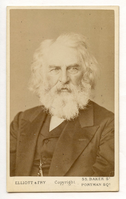 Portrait of Henry Wadsworth Longfellow. Head and shoulders visible against plain background. Longfellow turns his head slightly to his left. He wears formal attire and has chin-length white hair and a full white beard.