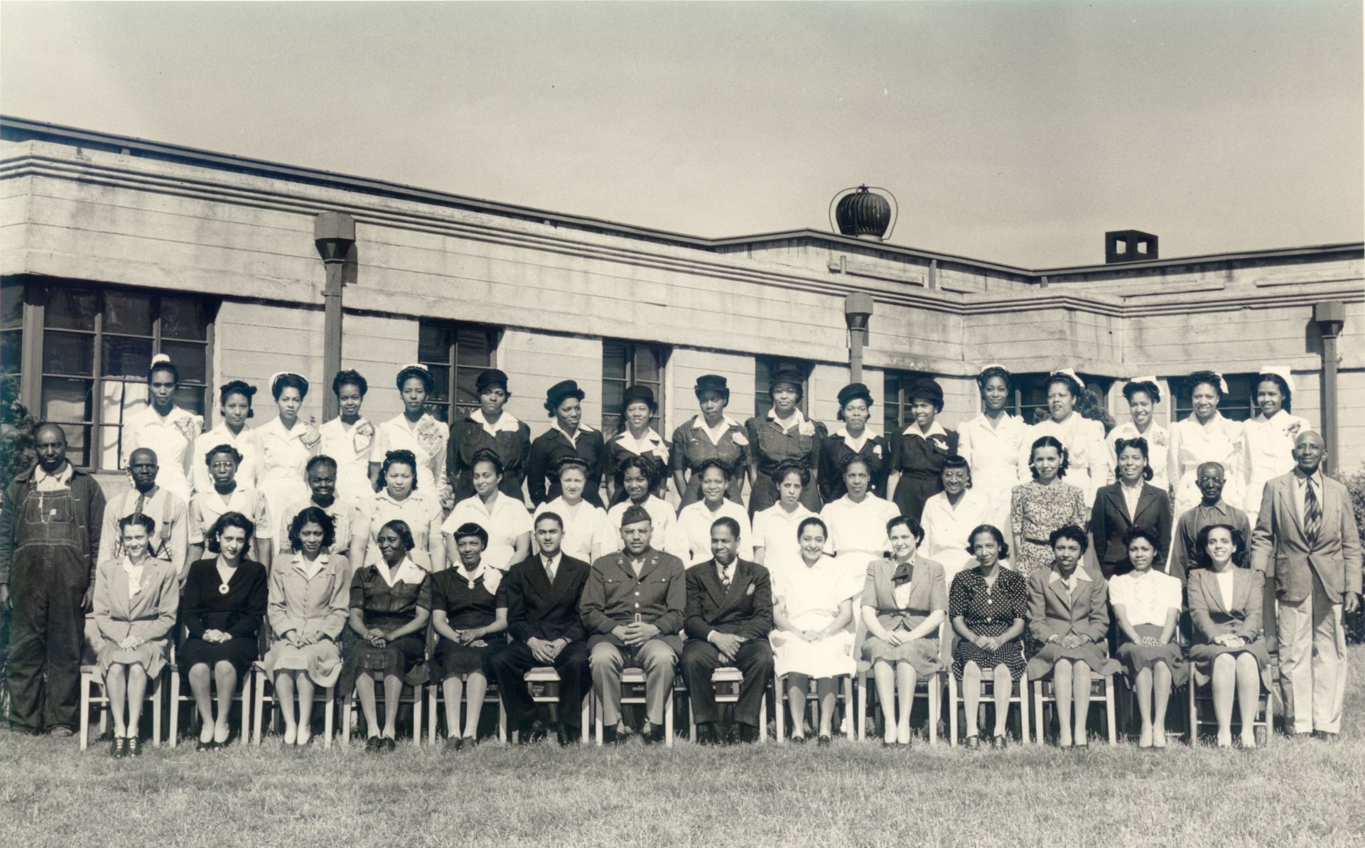 Drs. Maggie Laura Lewis and John W. Lewis with Slossfield Medical Center staff.