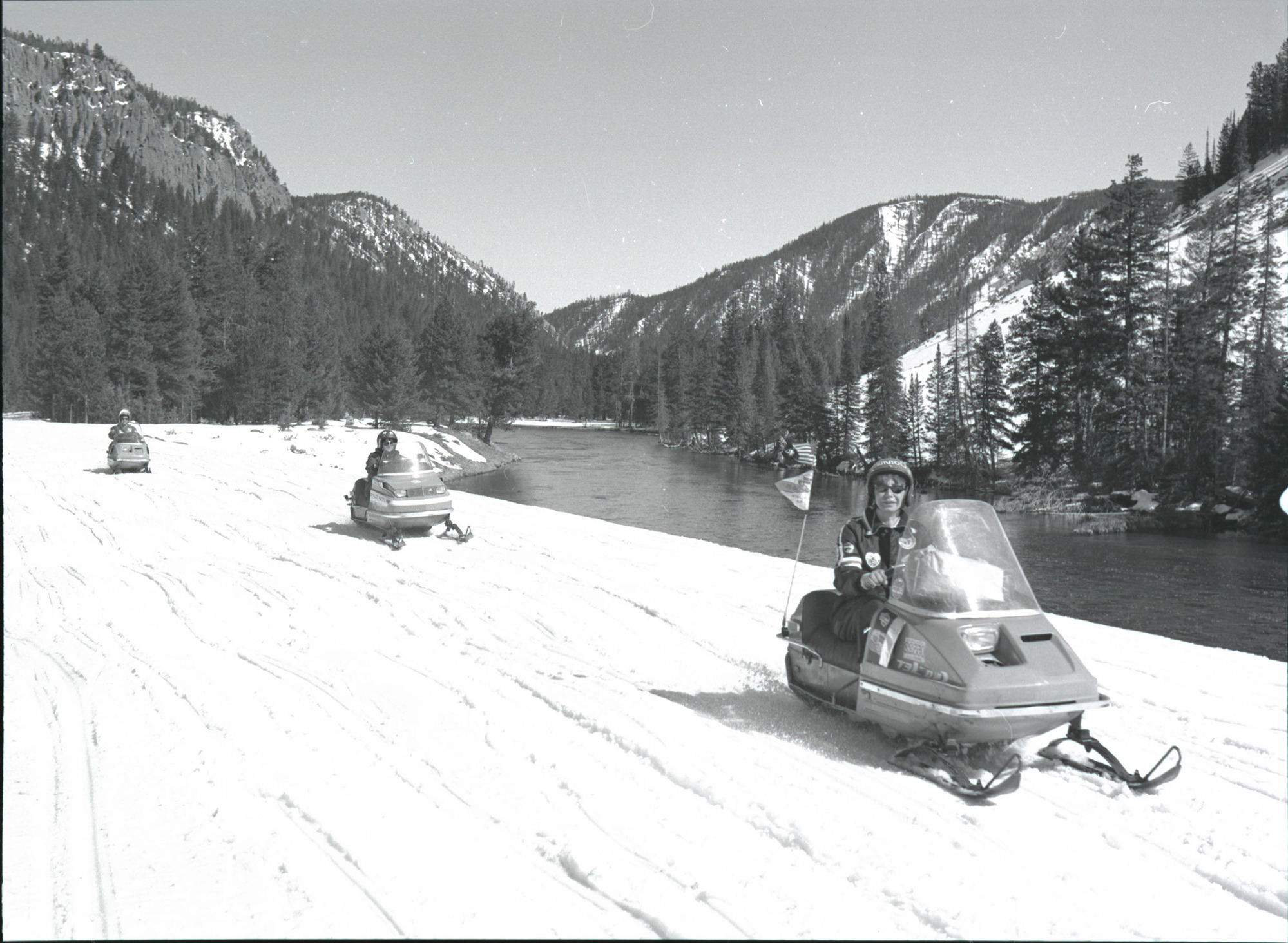 (Snowplow clearing roads in park)