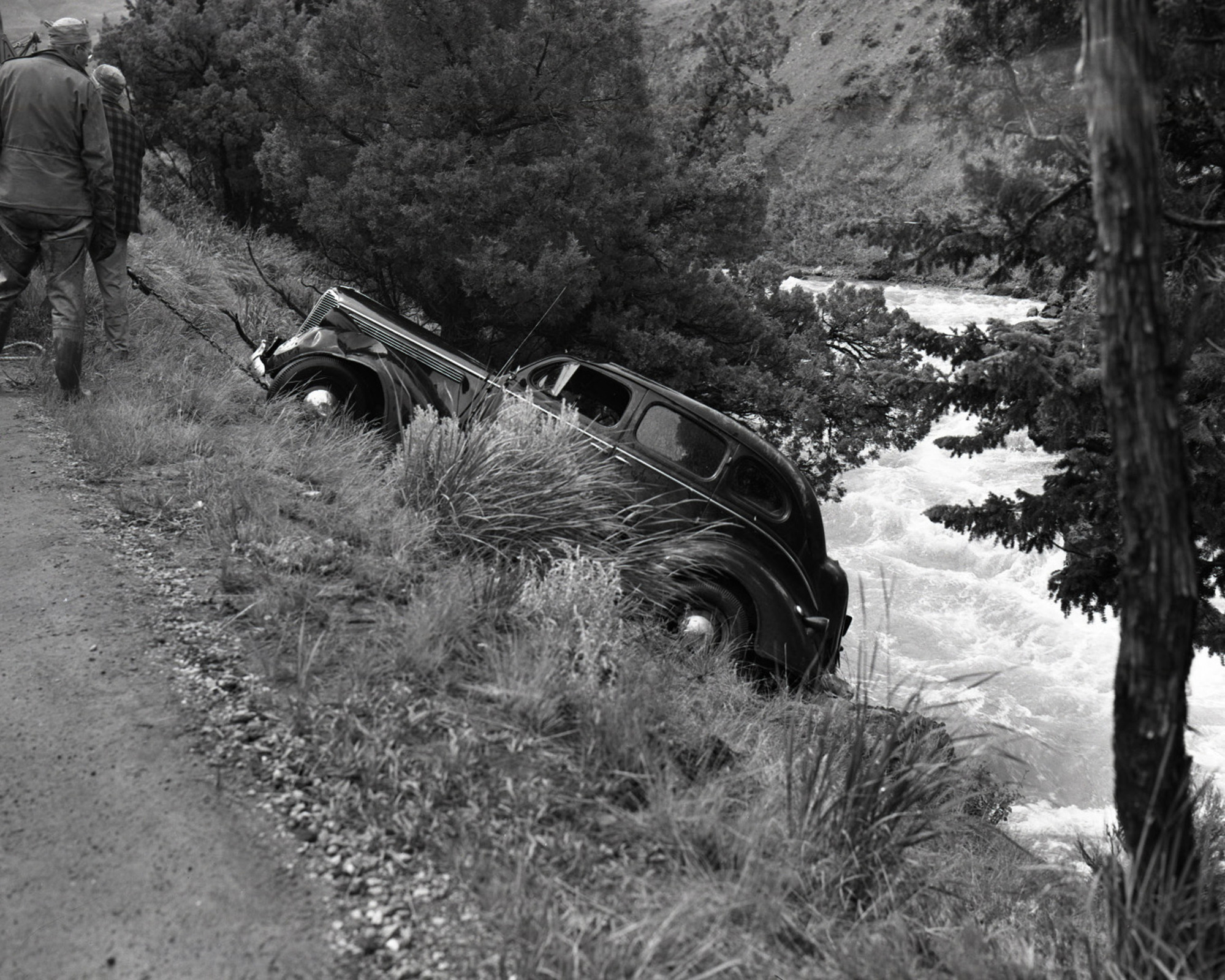 (Recovering car from site of accident)