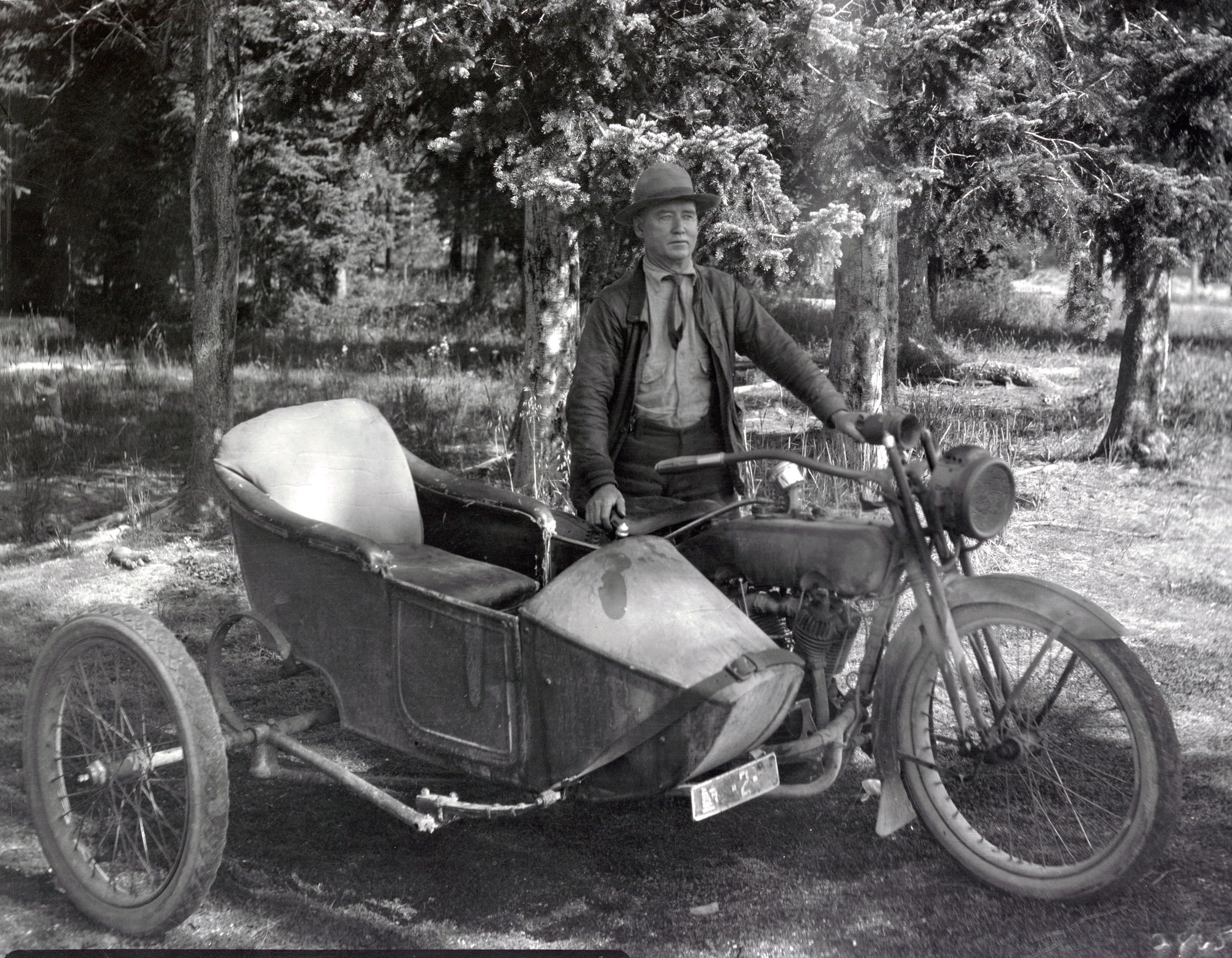 (First Chief Ranger James McBride with his motorcycle)