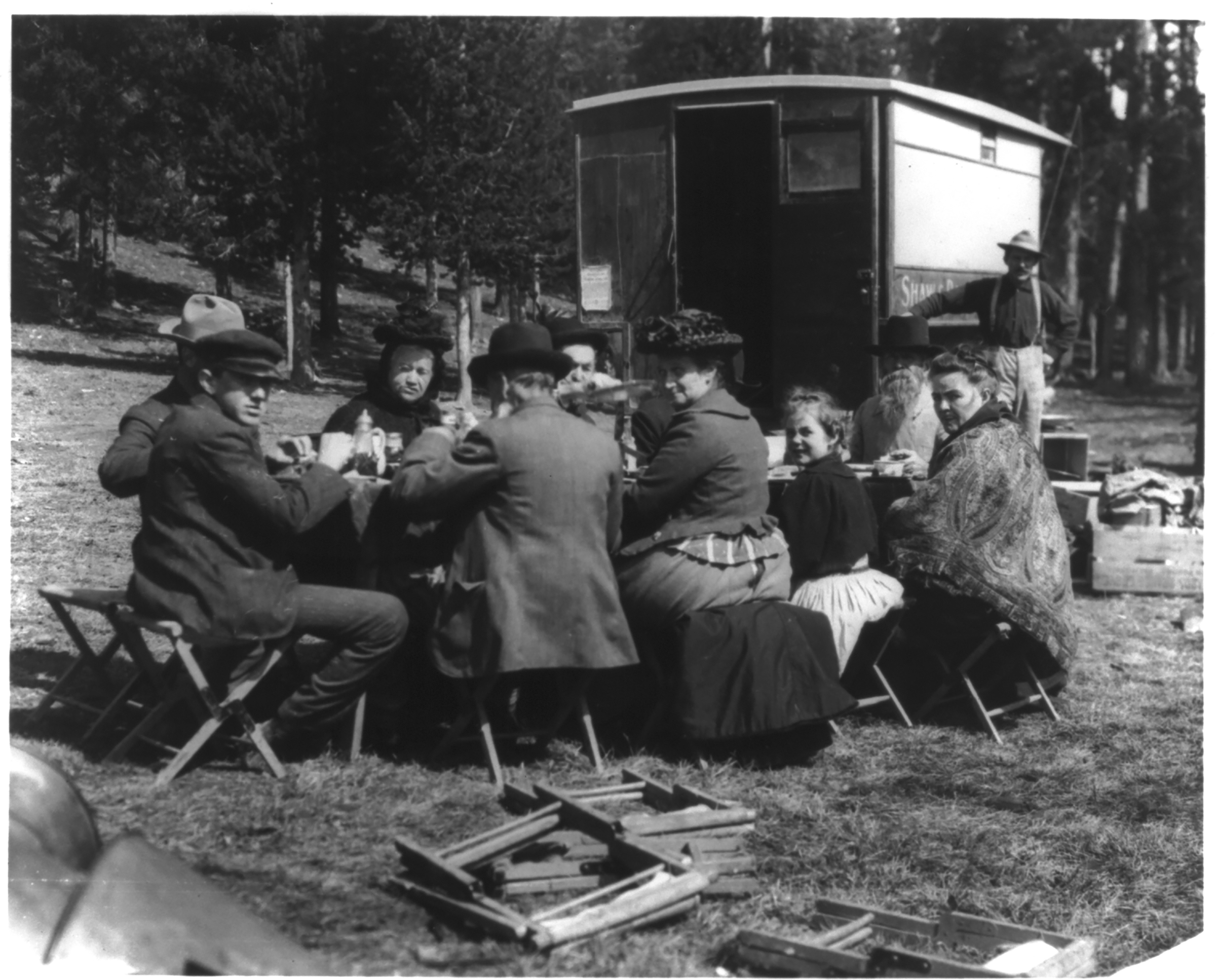 (Frances Benjamin Johnston at picnic table in Yellowstone National Park)