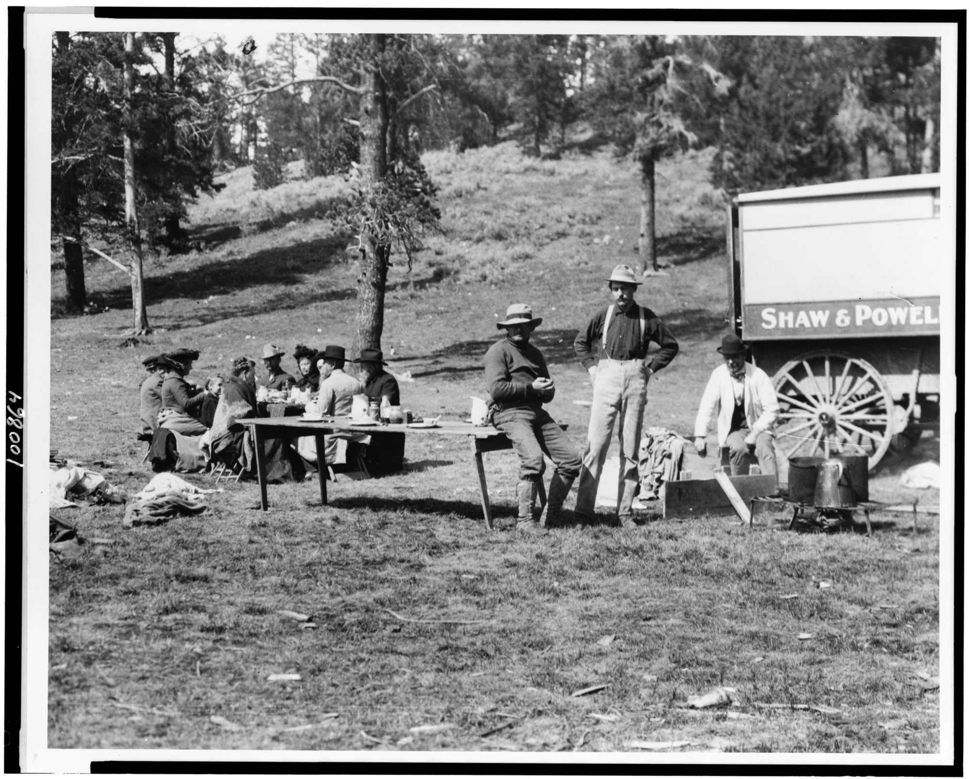 (Tourists and guides picnicking in Yellowstone Park)