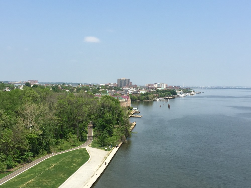 An overhead view of the Potomac river with a trail running along.