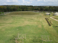 An aerial view of a grassy field.