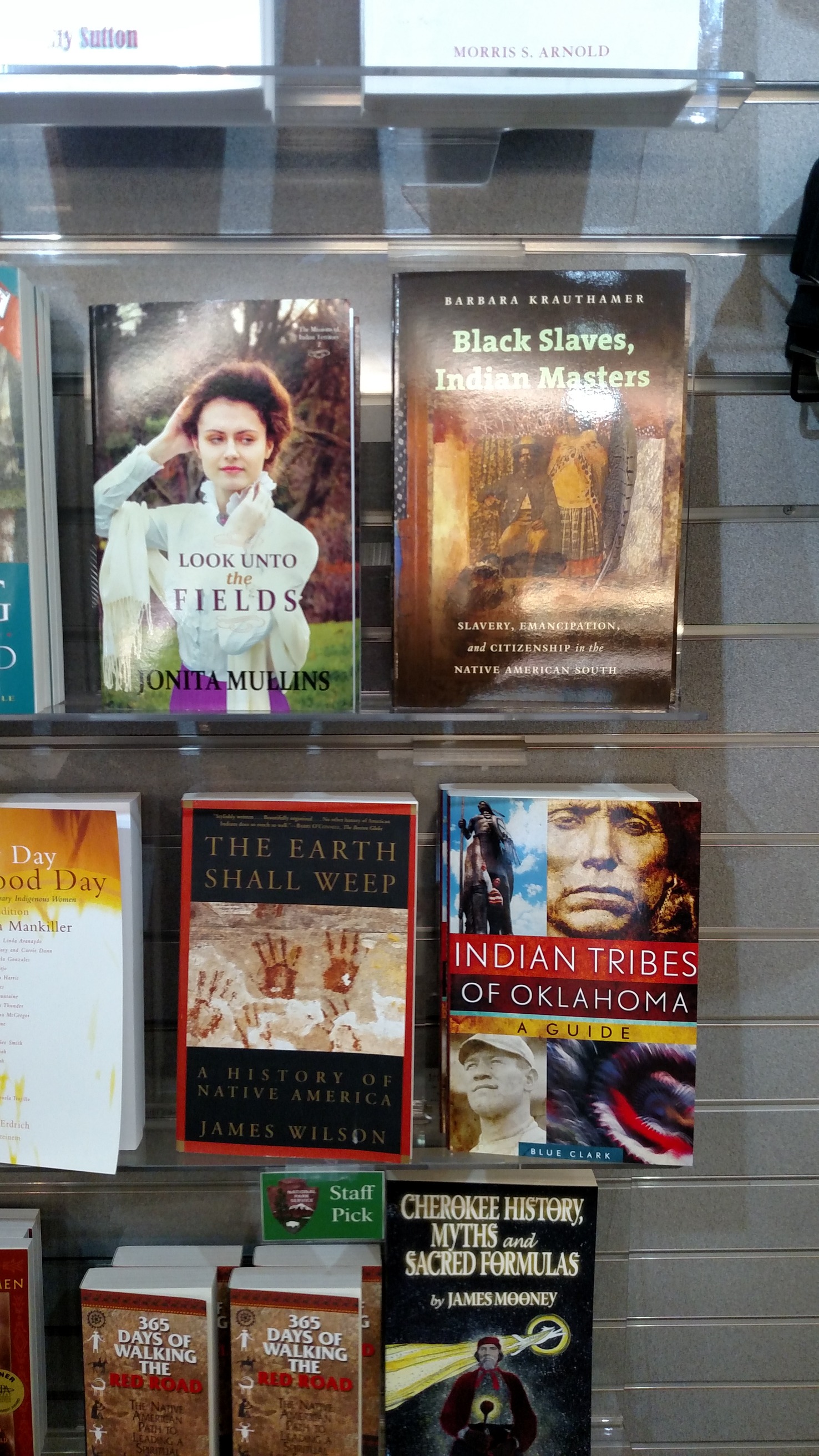 A display of books on a shelf.