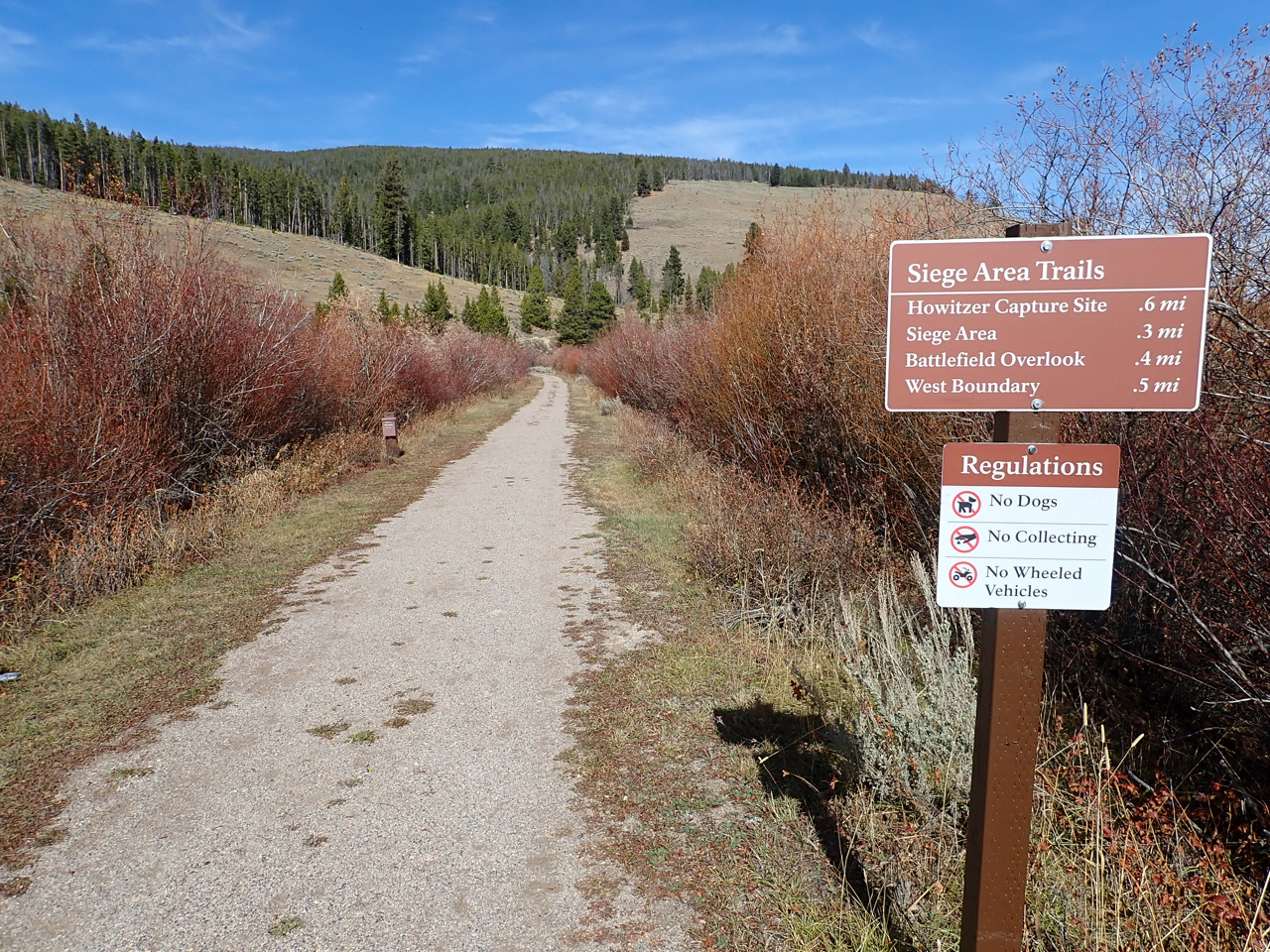 Trail signage showing distance