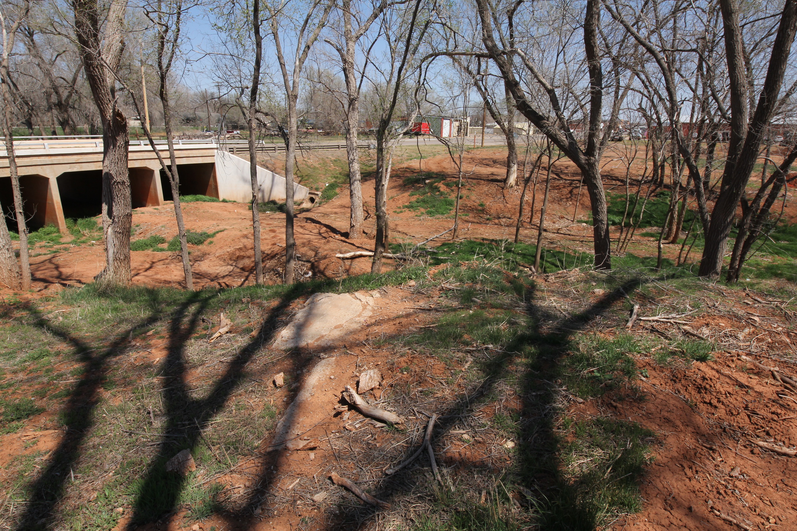 Lost bridge on Short Creek on 1926 route in Sayre at curve to old river bridge.