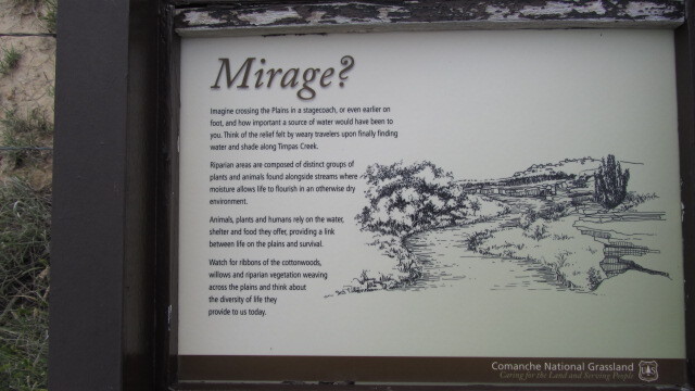 A wayside titled "Mirage" with some text and illustration on it.