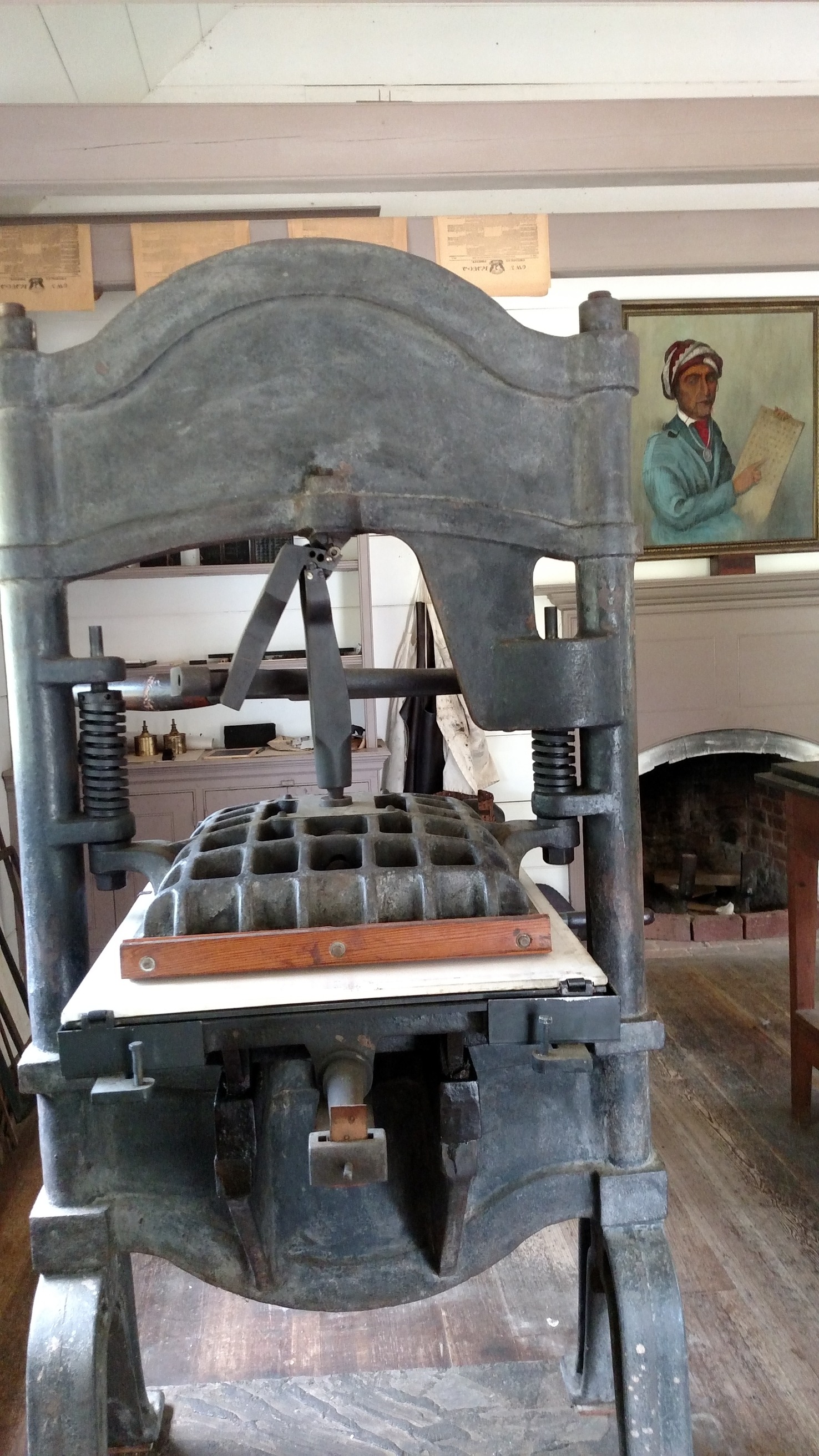 A large machine is sitting in a room.