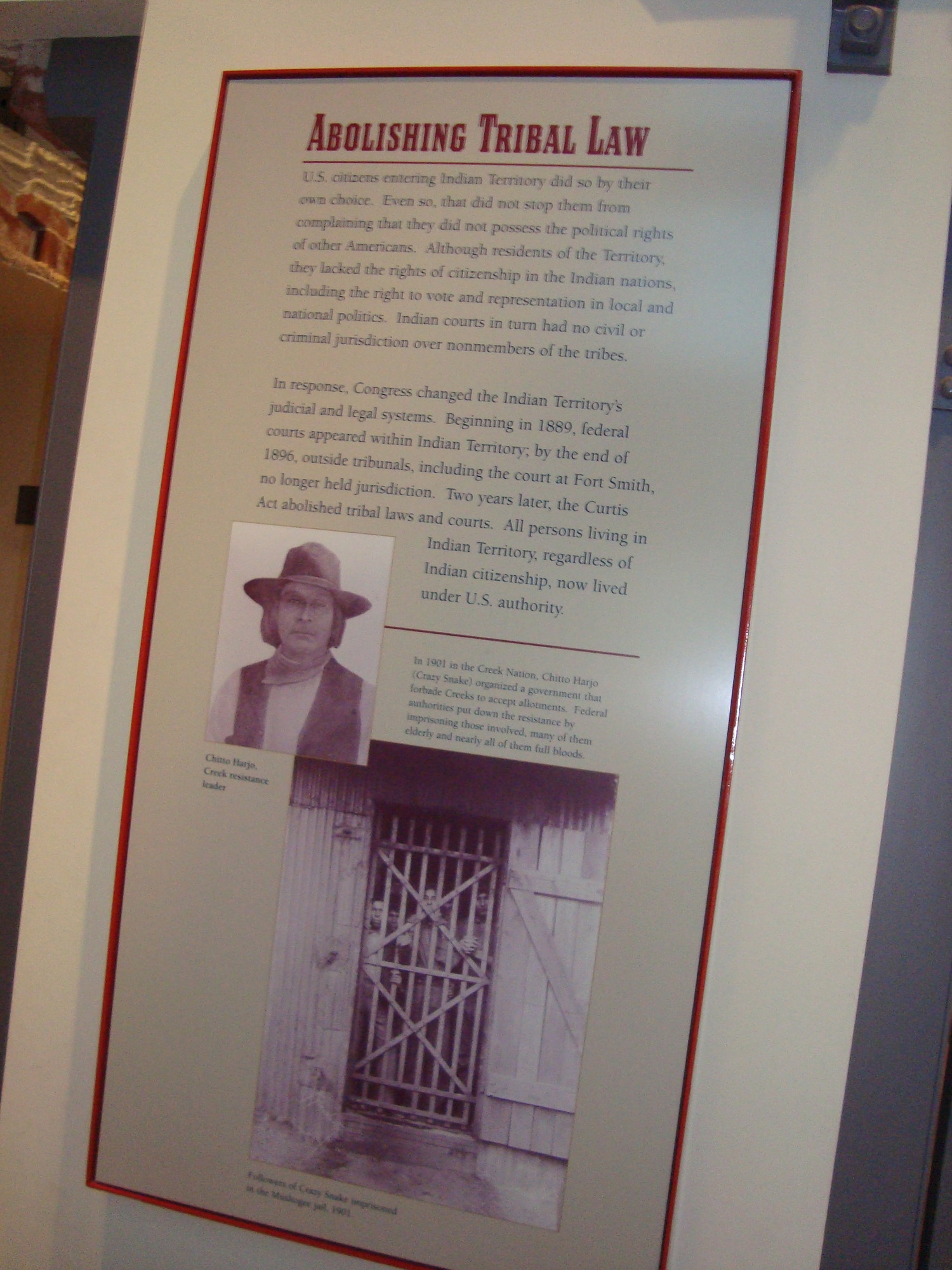 A poster with a picture of a man in a hat.