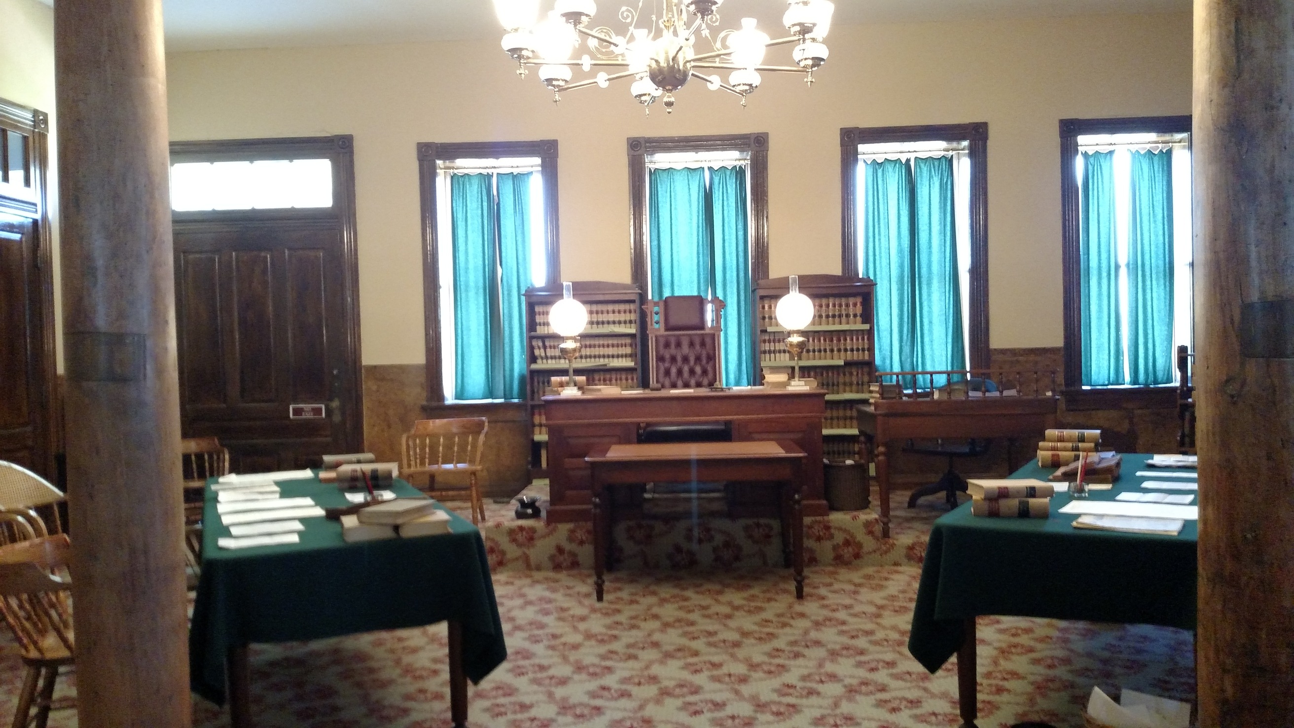 A room with tables and chairs.