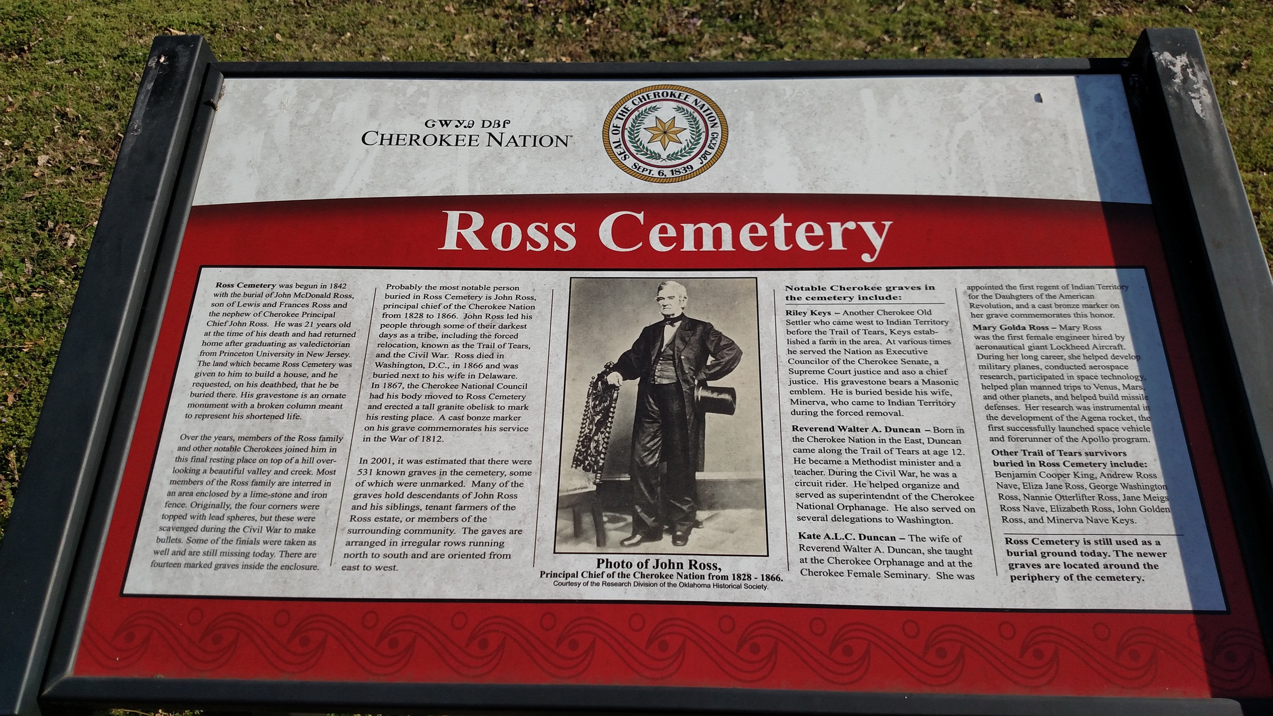 A wayside with the text "Ross Cemetery" on it.