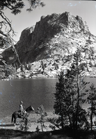 Art Holmes on horseback.