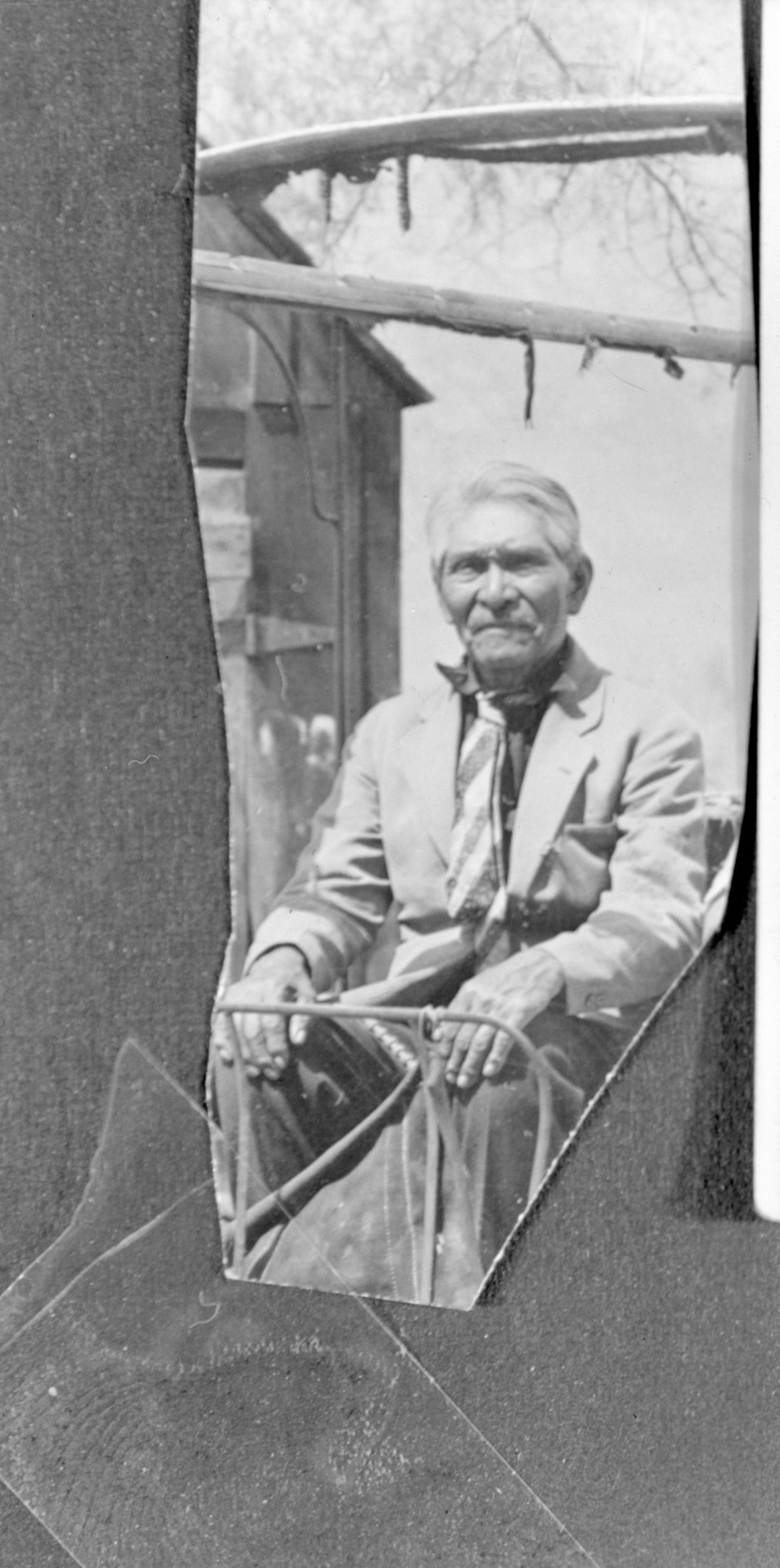 Bridgeport Tom, famous Piute Indian medicine man. Copied from section of postcard made by Frazer of Pomona on occasion of Tom's visit to Los Angeles for gall bladder operation. Copied Nov. 1950 by RHA. 2 1/2 x 5 (5 x 7)