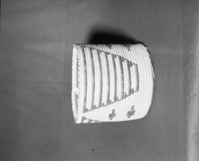 Mrs. Donald Segerstrom Collection. Object: Papago wastepaper basket. Dimensions: 12 x 10 1/2". Materials: yucca, devil's claw, joshua tree root. Technology: ---. Collection History: ---. Photographed by Michael Dixon, 1/83. Catalogued by Craig Bates and Barbara Beroza. Yosemite Collections, National Park Service.
